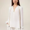 Bluse aus Crêpe-Stoff mit Kette